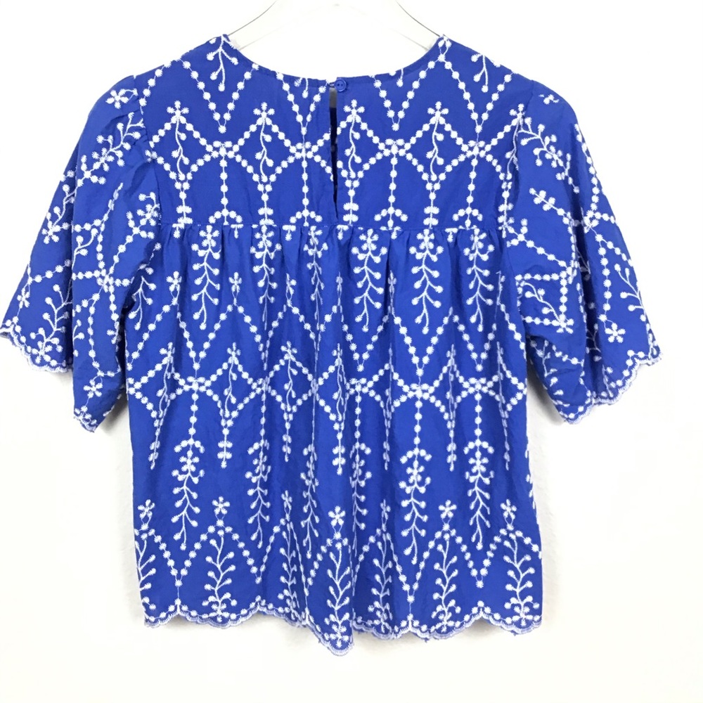 Rebellion Blue w/White embroidered flowers Top L - Picture 2 of 5